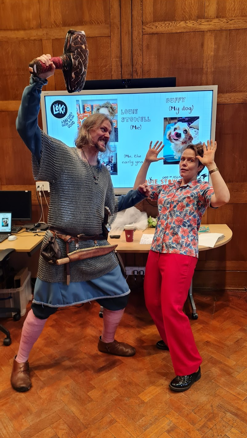 Me looking helpless in the face of a fierce viking, armed with a massive, albeit spongy, hammer